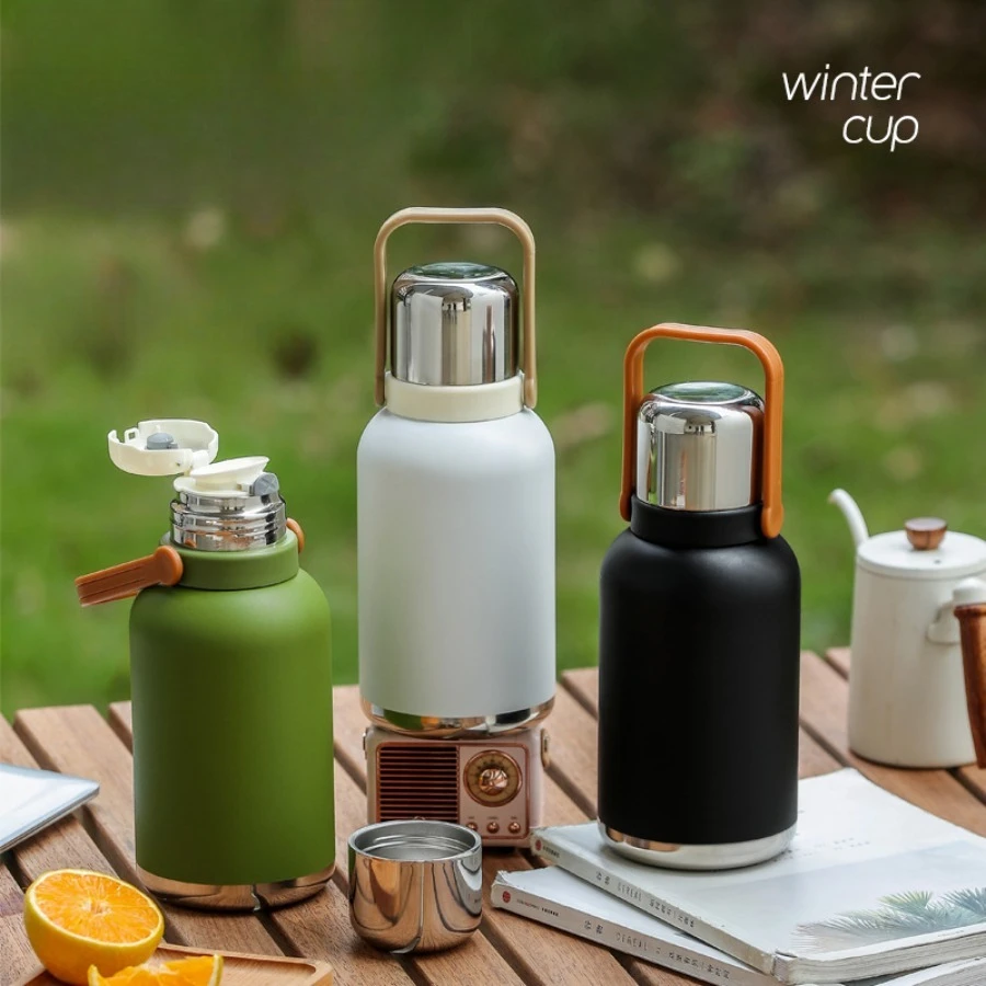 

New stainless steel insulated cup pot tea water separation high color value large capacity household portable water cups