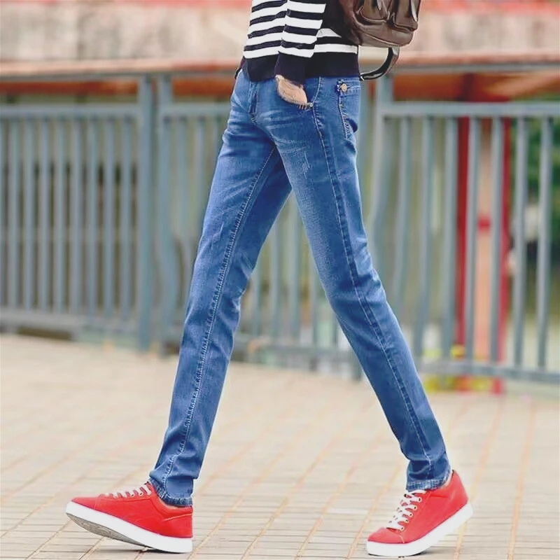 Onzichtbare kruisbroek Lente en herfst elastische jeans Heren Nauwsluitende kleine voeten Blauwe casual broek Heren Dating Mode
