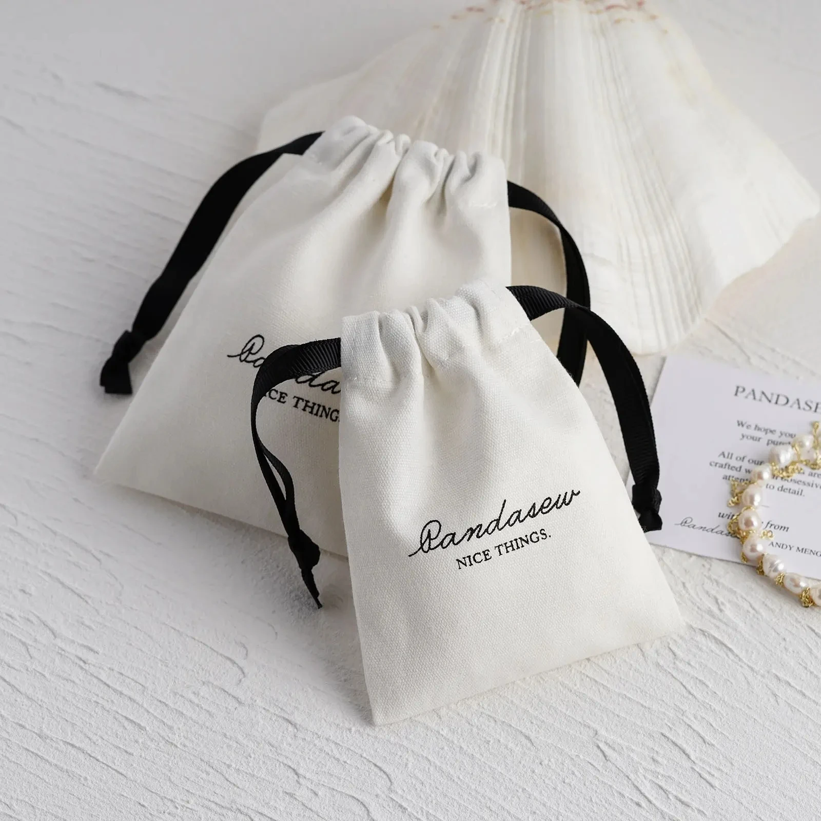 100Pcs Custom Logo Natural White Cotton Bags Earring Necklace Rings Jewelry Packing Pouch Drawstring Sack Holiday Gift Organizer