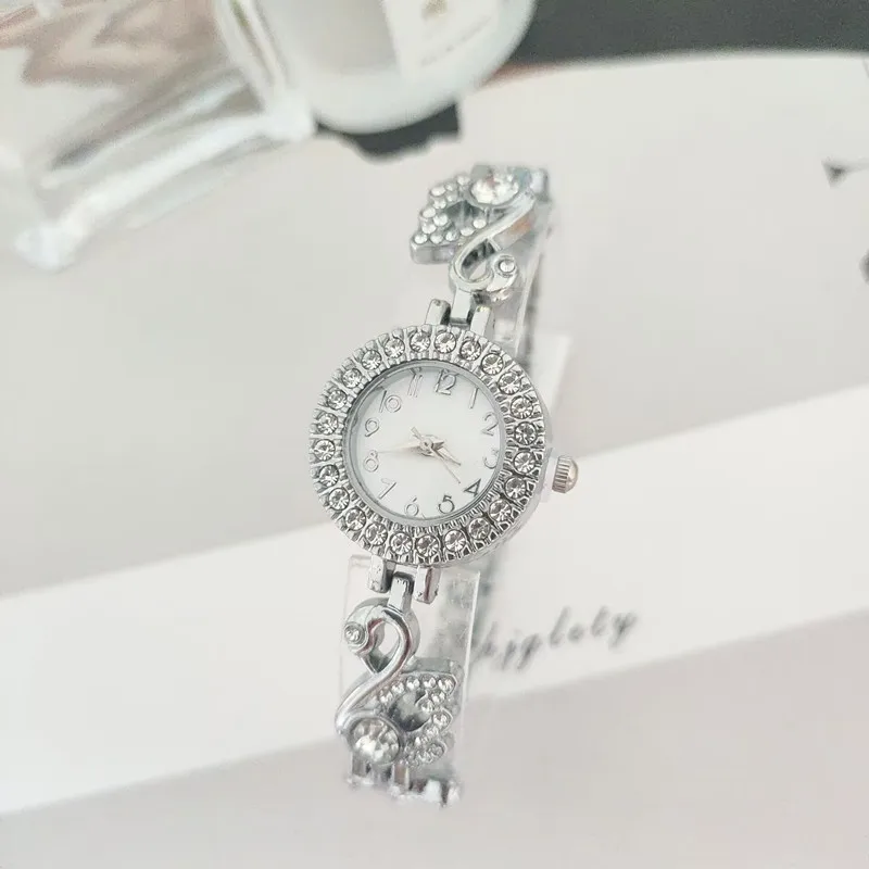 ساعة نسائية رشيقة وعصرية بجعة ساعة نسائية رقمية طالبة ساعة ذهبية ساعة فاخرة Reloj