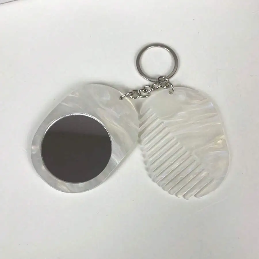 

2-In-1 Mirror And Hair Comb Keychain Pendant For Women Daily Use