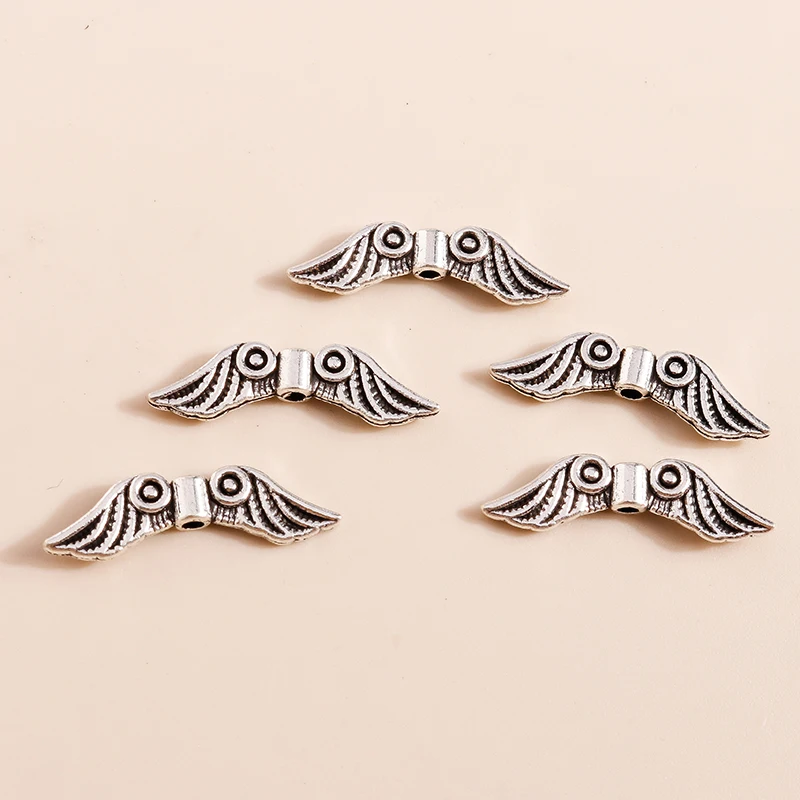 Leslie 40 Stück 7 x 23 mm Vintage Federflügel Charms Perlen für Anhänger Halsketten handgefertigte Armbänder Schmuckherstellung Zubehör – Detail 6