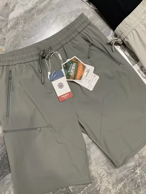 

Three-Proof Black Tech Ice Silk Quick-Drying Breathable Men's Shorts Outdoor Series Summer 2026 Standard Fit Nylon Lycra