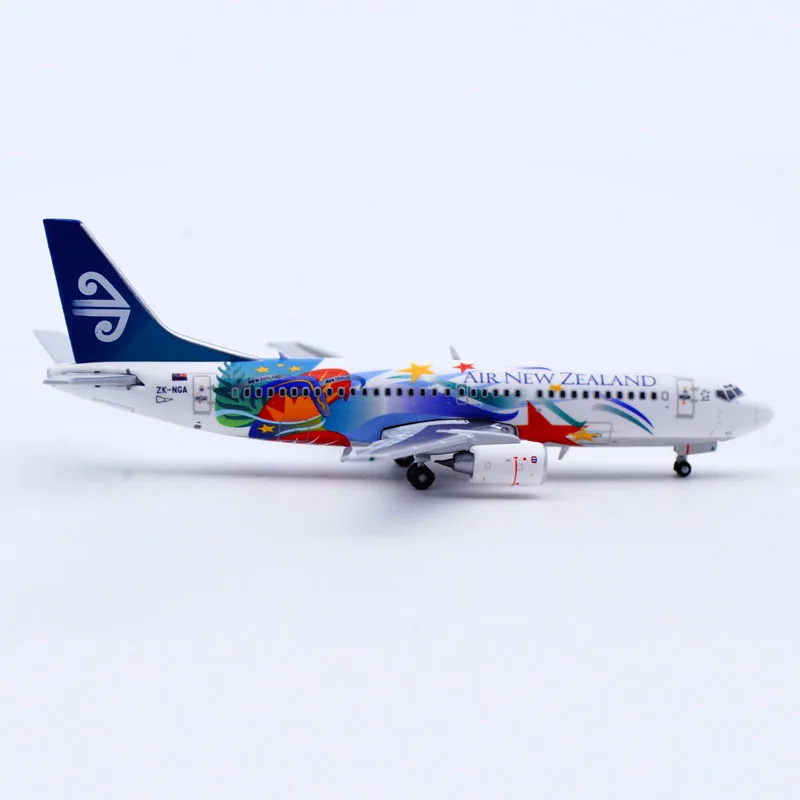 XX4969 โลหะผสมสะสมเครื่องบินของขวัญ JC Wings 1:400 Air นิวซีแลนด์ "StarAlliance" โบอิ้ง B737-300 เครื่องบิน Diecast รุ่น ZK-NGA