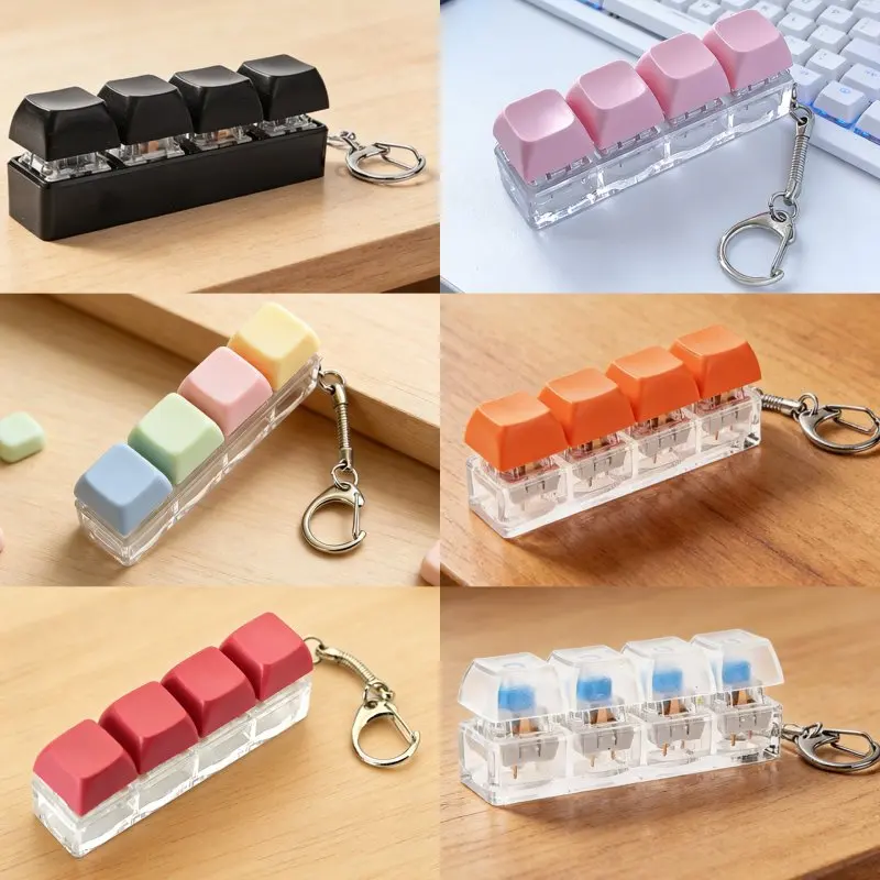 Kreativer 7-Farben Nicht-Leuchtender Tastatur-Pop-It-Fidget-Schlüsselanhänger Unisex Taschen- und Autoanhänger Dekoration Wirtschaftlicher Schlüsselring