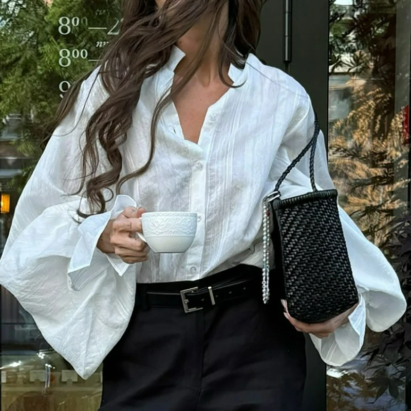 The New Spring and Summer European-style Stand-up Collar Loose Shirt with Long Sleeves Features Stylish Casual Design Commuting