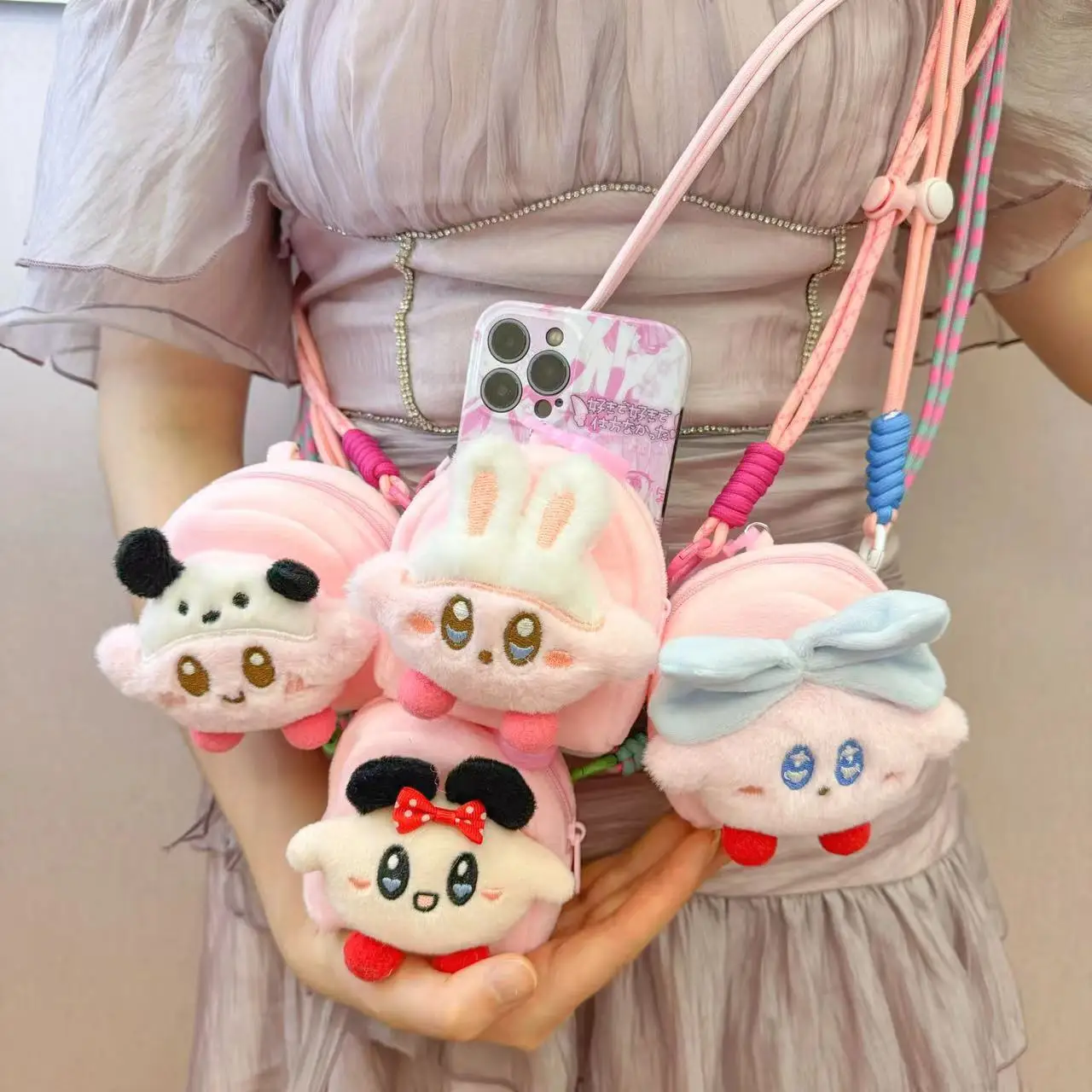 

Cute pink Star Kirby bag for storing loose change, also suitable for Bluetooth headphones, key fob, and mobile phone. Suitable f