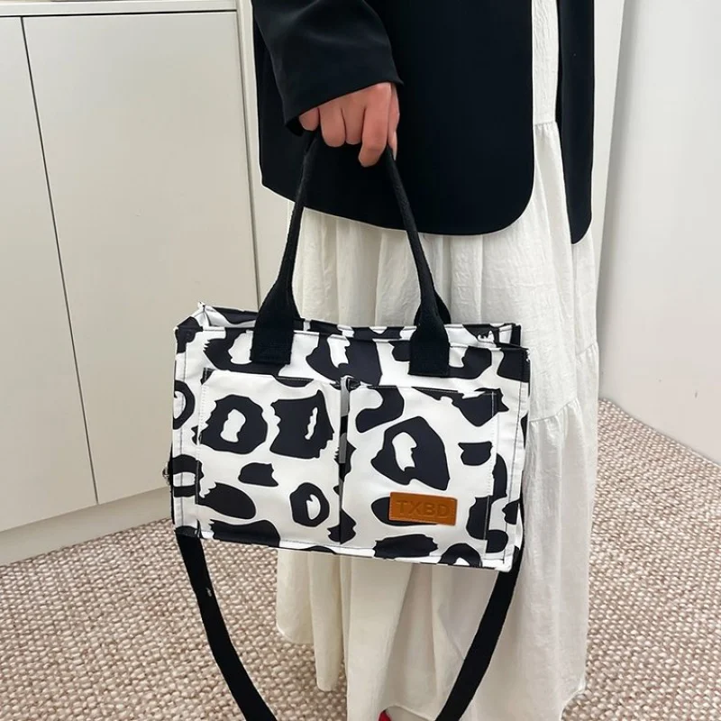 

Unique Solid Color Minimalist Handbag For Women Featuring Crossbody Strap And Large Capacity Design