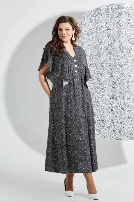 

Женское элегантное и изысканное платье с рюшами.