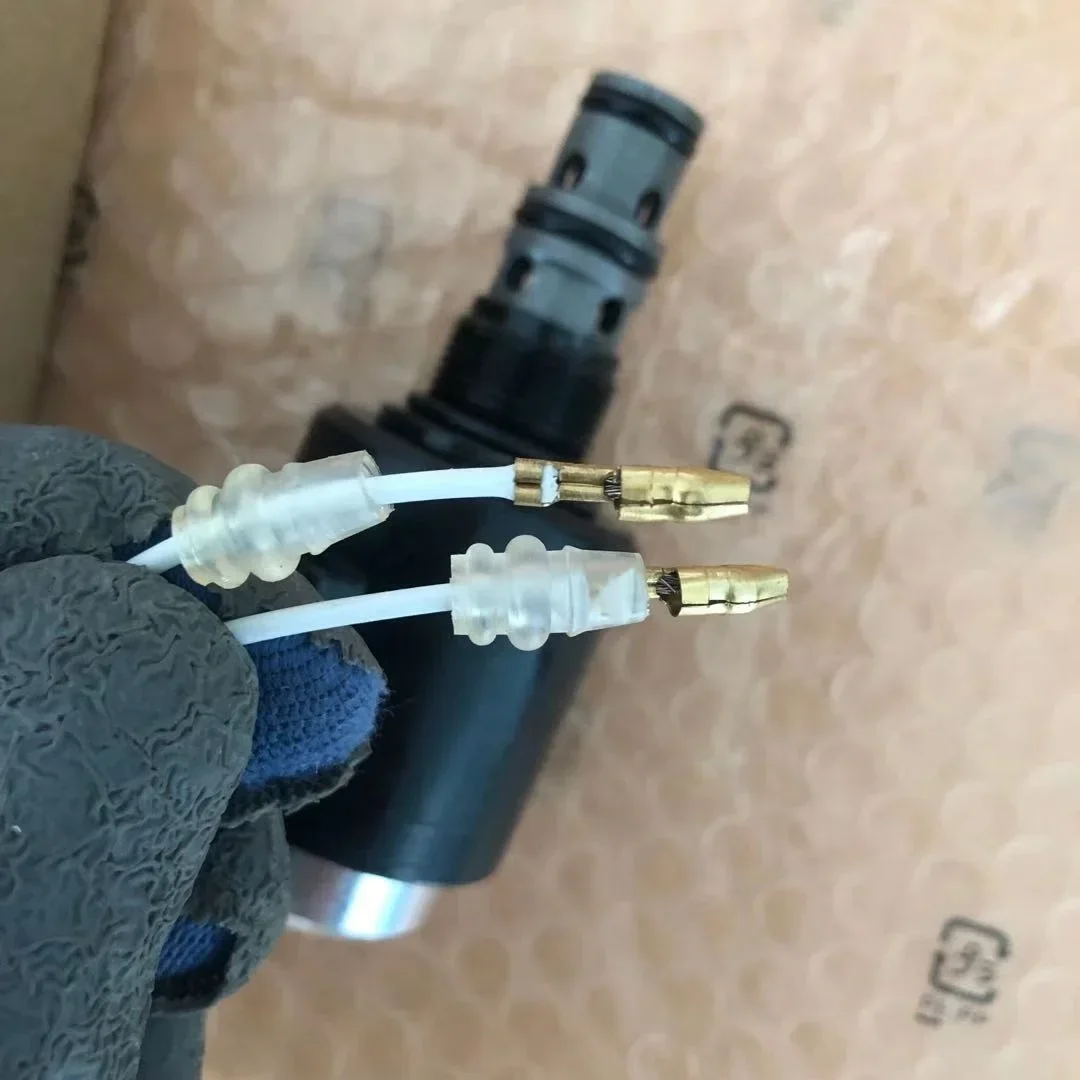 Dongju Katup Solenoid DC24V Kualitas Tinggi 38553-70500 untuk Suku Cadang Wheel Loader Ekskavator dan Derek SD1231-C-11