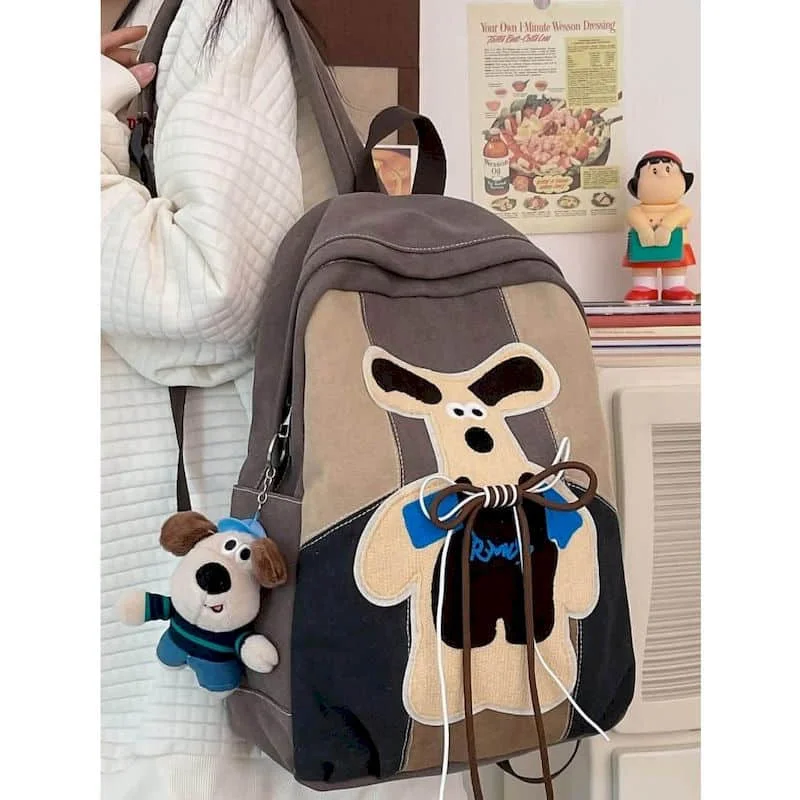 حقائب ظهر قماشية مضحكة للنساء Harajuku Student سعة كبيرة حقيبة ظهر غير رسمية مرقعة للرجال والنساء 2025 جديدة في حقيبة مدرسية