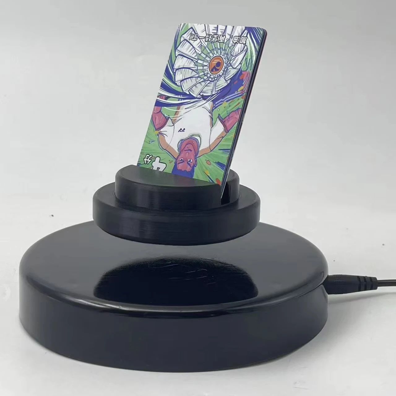 

Customize Rotating Magnetic Levitation Wireless Sport And Trading Bank Poke Card Display Stand