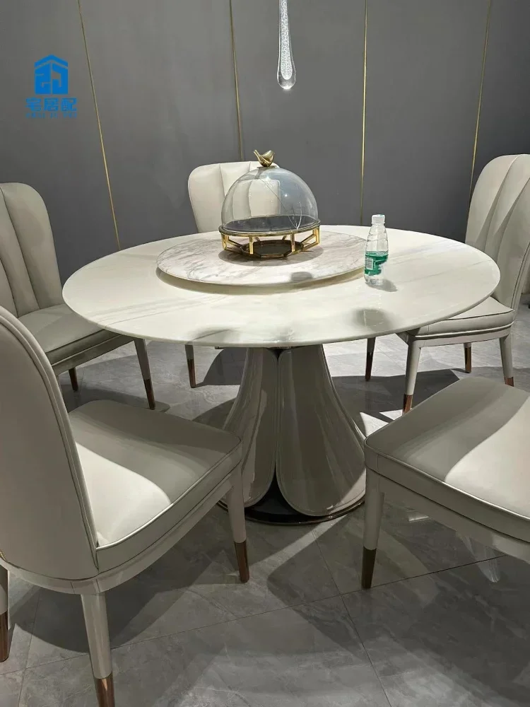 Italian light luxury post-modern high-end restaurant round table jazz white natural luxury stone dining table chair