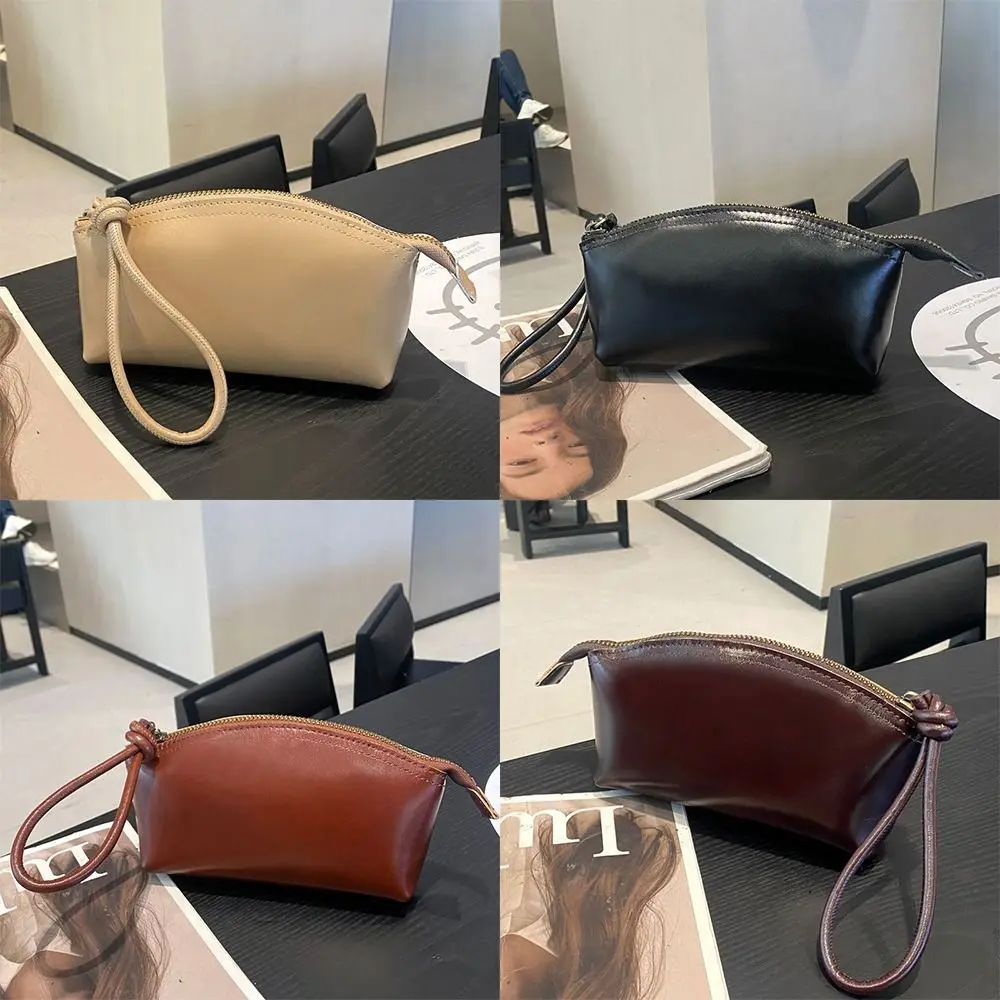 Large Capacity Vegetable Tanned Leather Handbag Light Luxury Lightweight Shell Clutch Bag Simple Design Wrist Coin Purse view 4