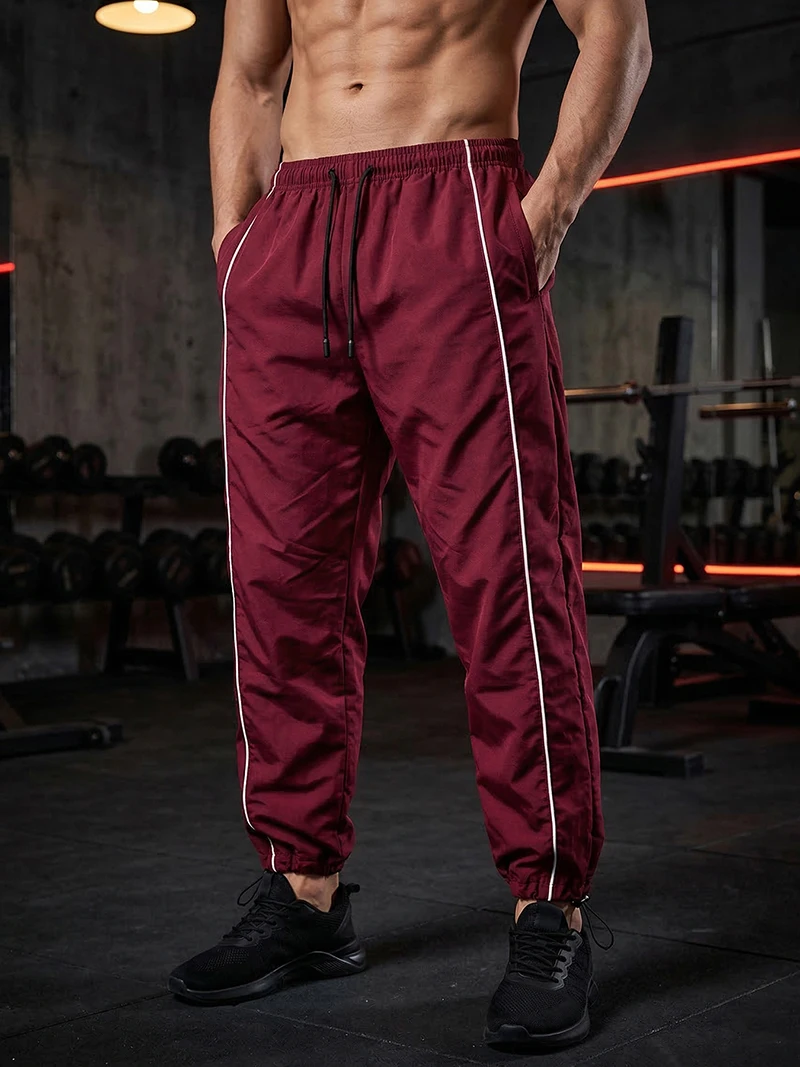 Trendige, sportliche Herrenhose mit Linien, Fitnessstudio, Workout, Laufhose mit Seitentaschen, sportliche, schnell trocknende, atmungsaktive Jogginghose – Detail 20
