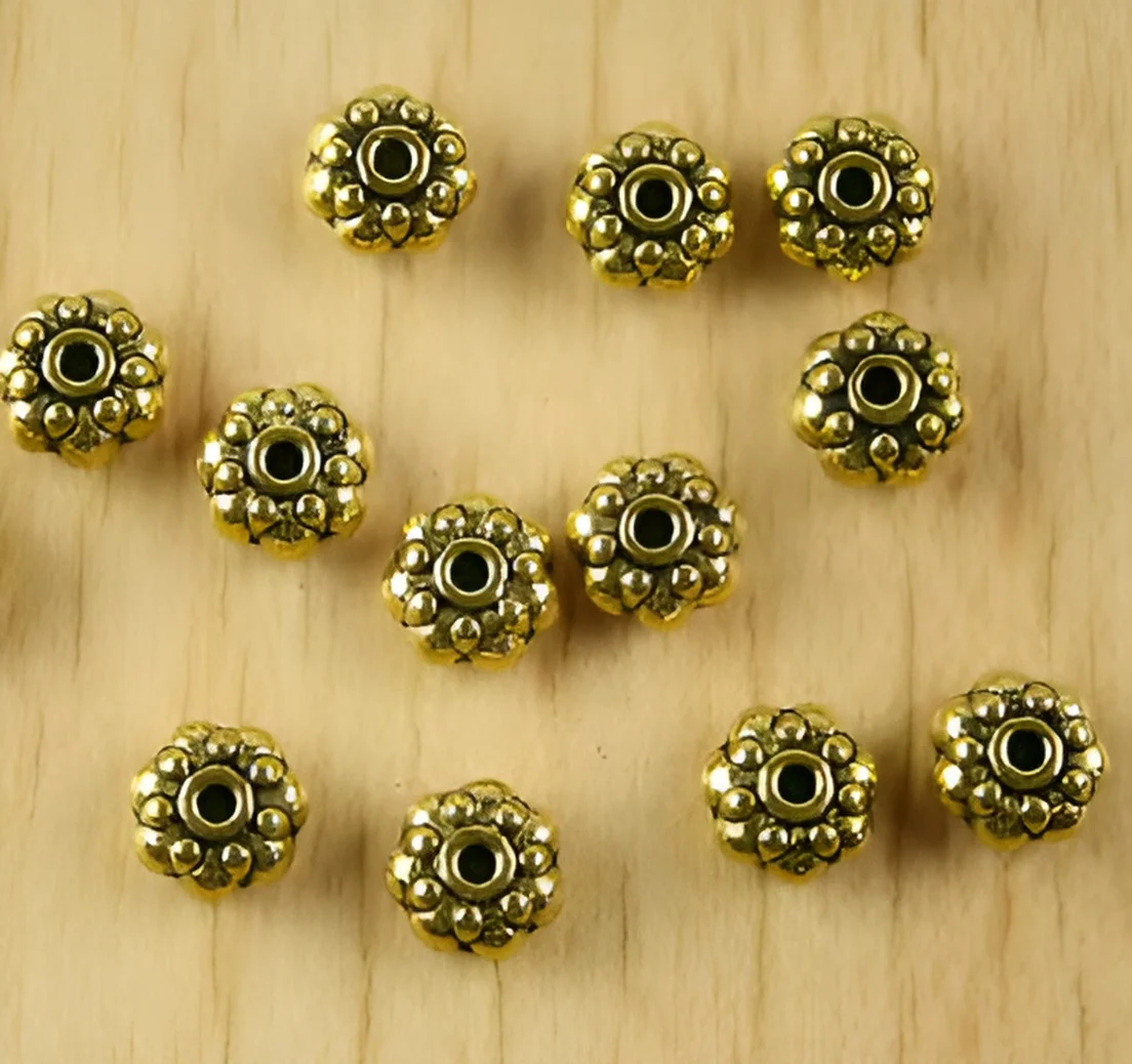 

50pcs 7.7x4.4mm ,hole 1.4mm Alloy matel studded oblate spacer beads HWH2114