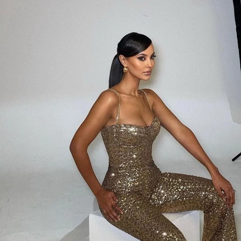 جمبسوت نسائي فاخر بتصميم ترتر ذهبي لحفلات أعياد الميلاد بدون أكمام بحزام سباغيتي مع حزام