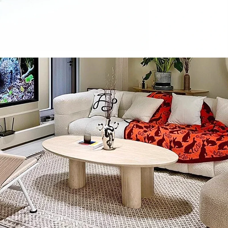 Nordic minimalist, natural beige travertine coffee table, creative designer model room, living room sofa, oval coffee table