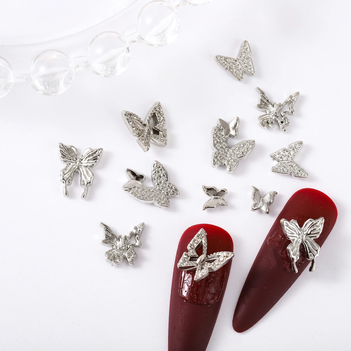 60 uds/1 caja de mini adornos de uñas de mariposa de aleación japonesa ins viento contrajo joker chica decoración artesanal de uñas