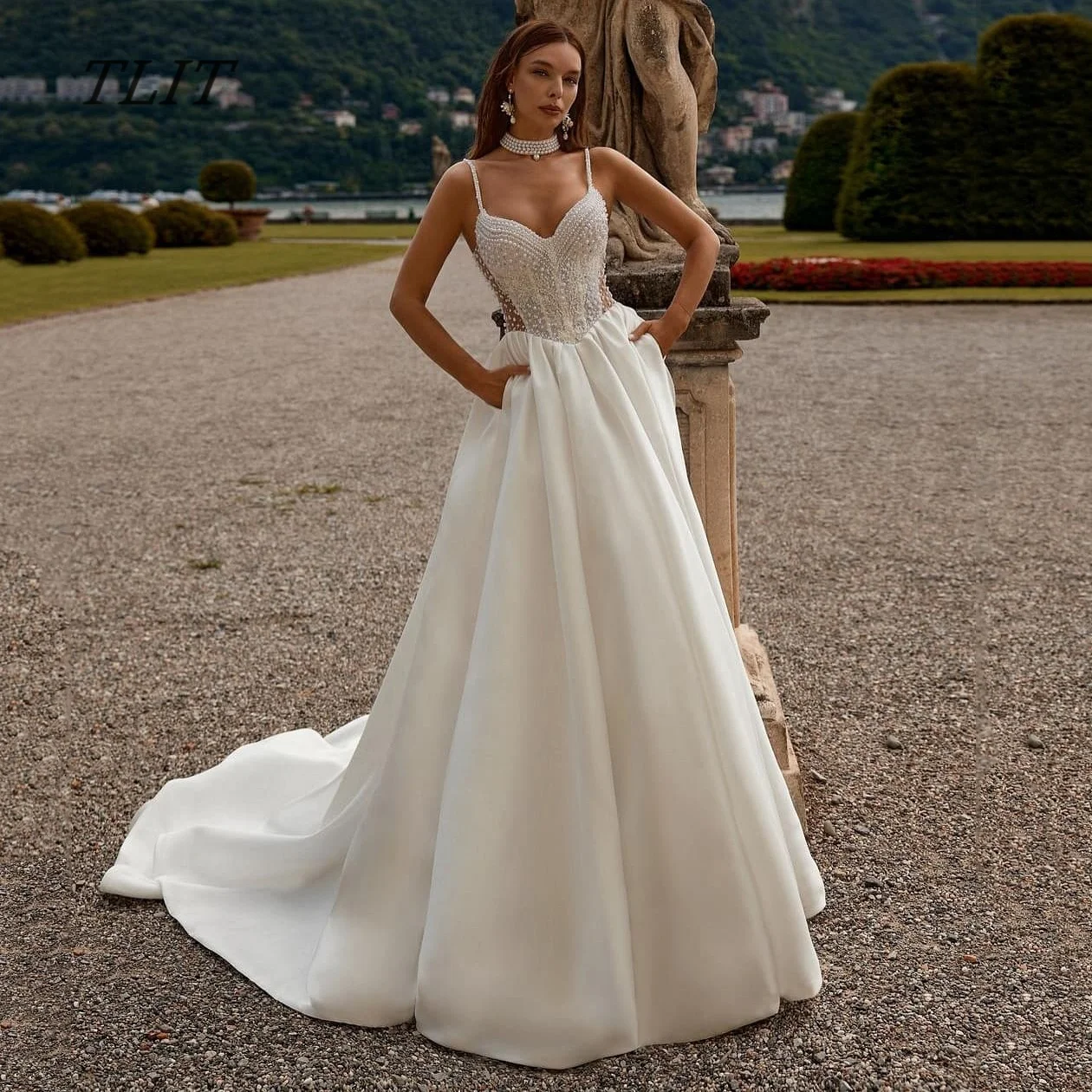 TLIT Maßgeschneidertes elfenbeinfarbenes A-Linien-Brautkleid aus Satin mit Perlen, herzförmigem Ausschnitt und Spaghettiträgern – Luxuriöses Hochzeits- und Partykleid