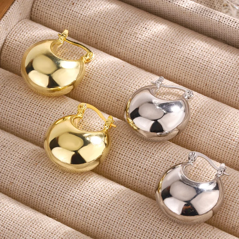 

European and American classic hollow ball metal earrings copper plated women's heavy-duty retro texture earrings