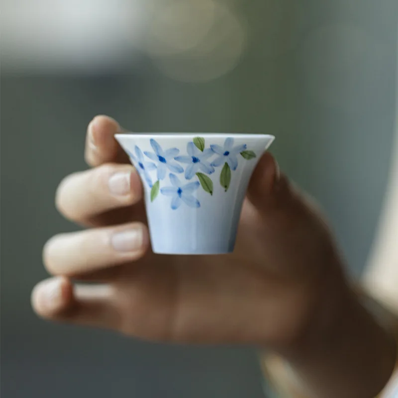 Jade mud white porcelain hand-painted small blue flower tea cup Kung Fu tea set household gradual change blue tea cup single cup