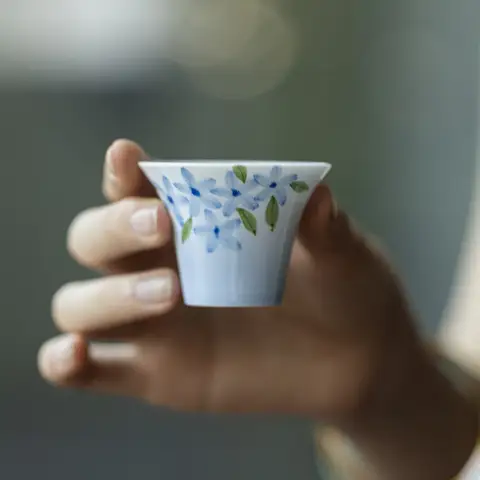 Jade mud white porcelain hand-painted small blue flower tea cup Kung Fu tea set household gradual change blue tea cup single cup