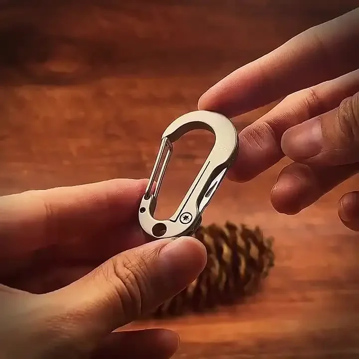 1pc Multi Functional Titanium Alloy Keychain With Folding Sharp Knife - Perfect For Outdoor Camping Emergency Situations