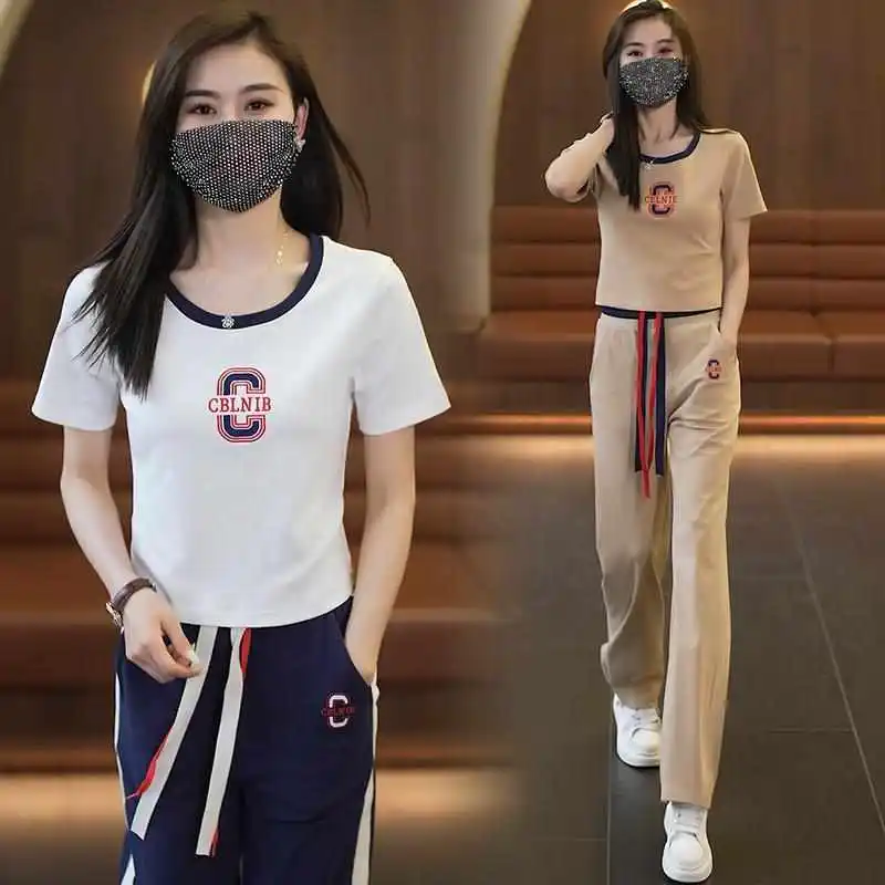 

Модный повседневный женский летний костюм-двойка из семи предметов с воротником на молнии, из полиэстера