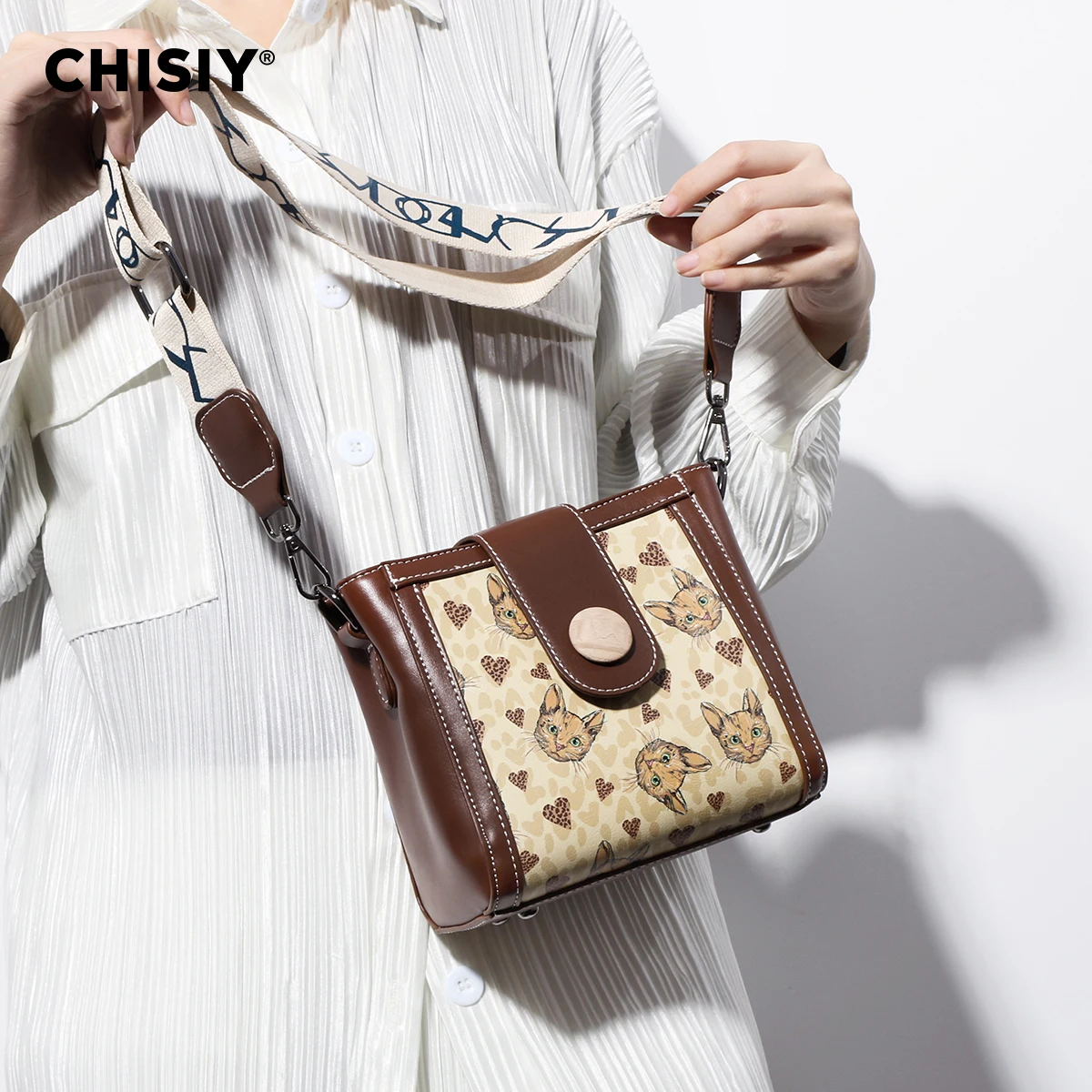 CHISIY Original handmade minimalist texture cartoon embossed cat versatile commuting single shoulder crossbody bag