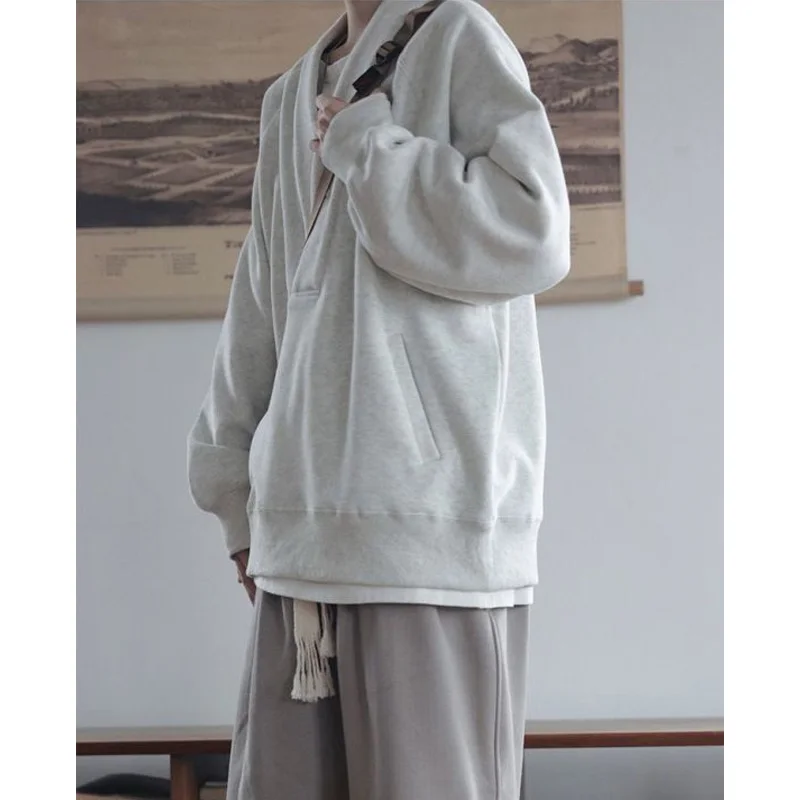 2023 nuova moda primaverile e autunnale semplice alla moda da uomo con scollo a v allentato Casual piccolo cucciolo bello maglione Oversize da uomo