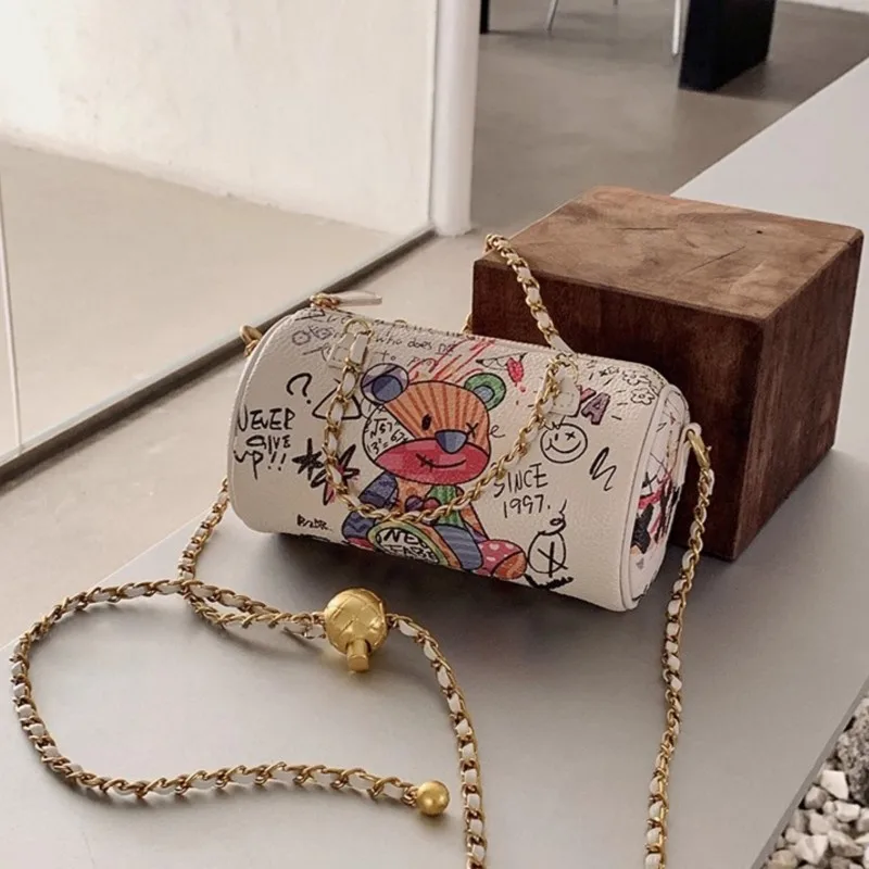 

Fashion Cute Playful Bear Handbag Women White Graffiti Style Cylinder Shoulder Bag Ladies Versatile Chain Letter Crossbody Bags