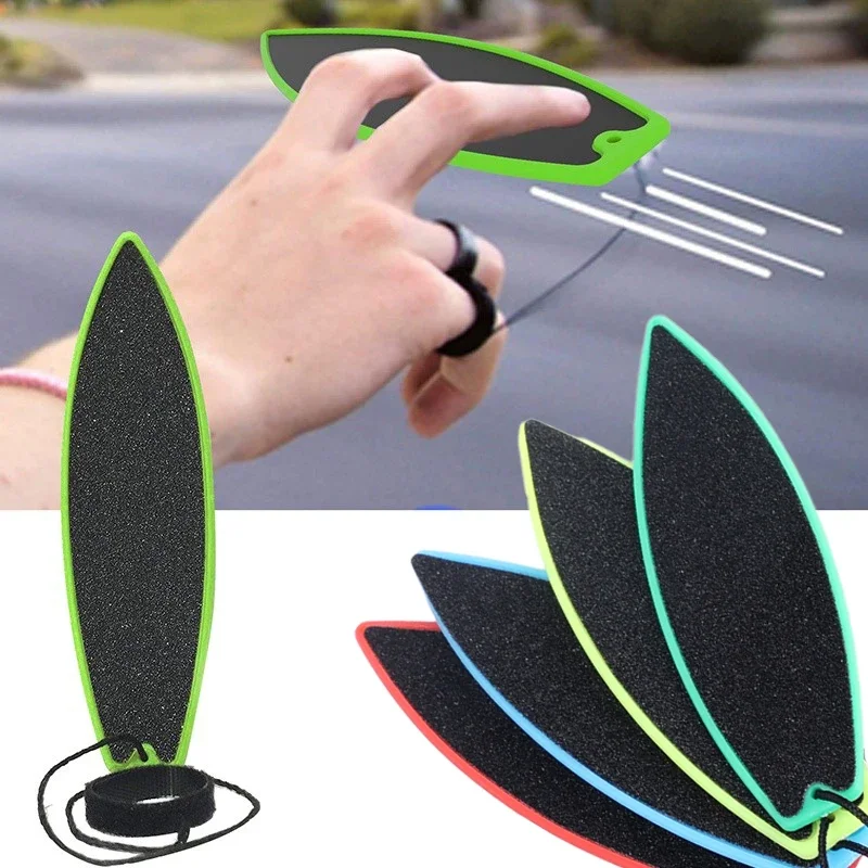 ของเล่นกระดานโต้คลื่นนิ้วมือขนาดเล็ก พร้อมสายคล้อง ดีไซน์คลื่นทะเล ช่วยคลายเครียด สำหรับการเดินทาง ท่องเที่ยว และแก้เบื่อ