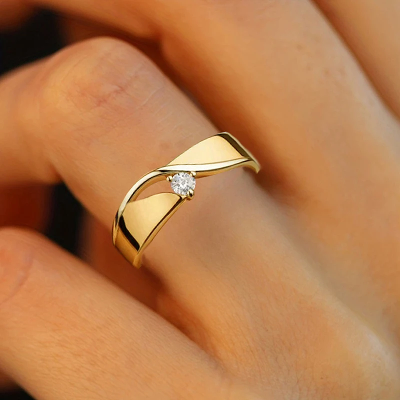 Huitan Damen-Ringe mit gedrehtem Band und einem kleinen Zirkonia, minimalistische Verlobungs- und Eheringe, Modeschmuck für Frauen – Detail 3