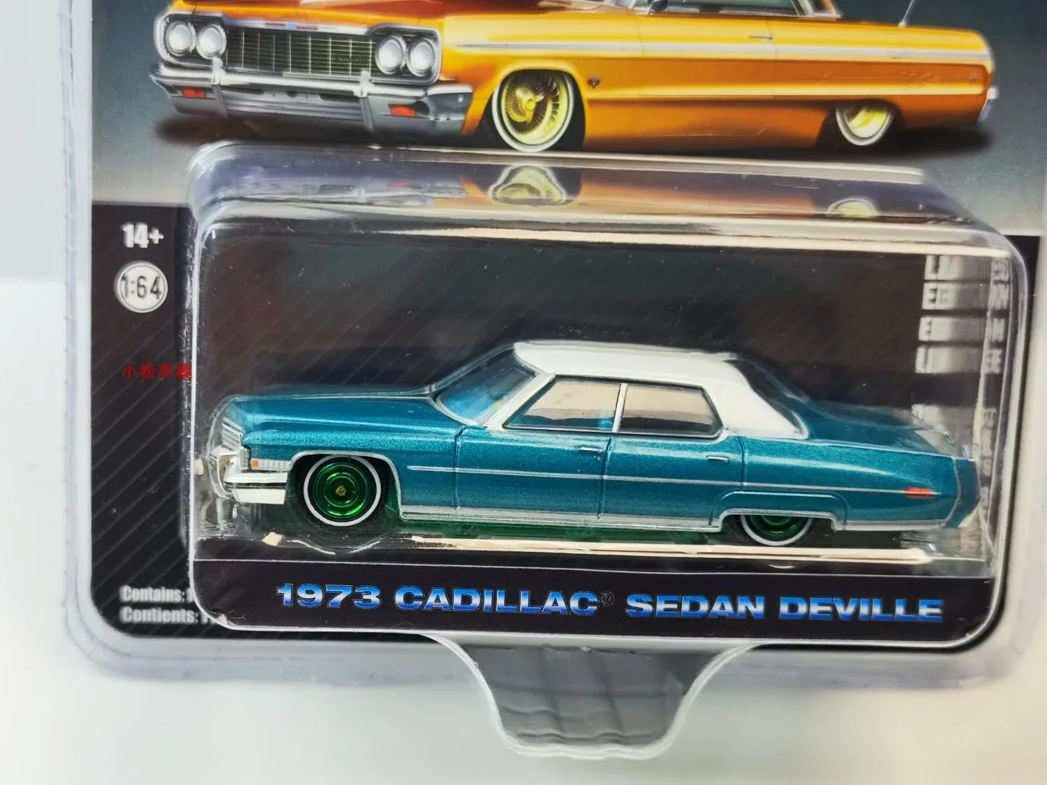 1: 64 1973 Cadillac, DeVille Blue Green and White Roof Green Edition Collection of car models