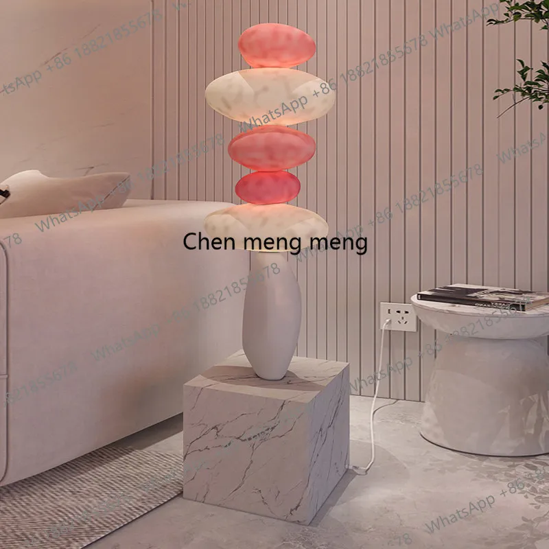 

Modern light luxury, TV cabinet next to the sofa in the living room, large floor lamp ornament, high-end decoration