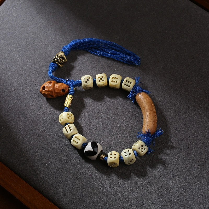 

Tibetan camel bone paired with sandalwood, tiger teeth, Tianzhu, hand rope, retro ethnic style woven hand rope