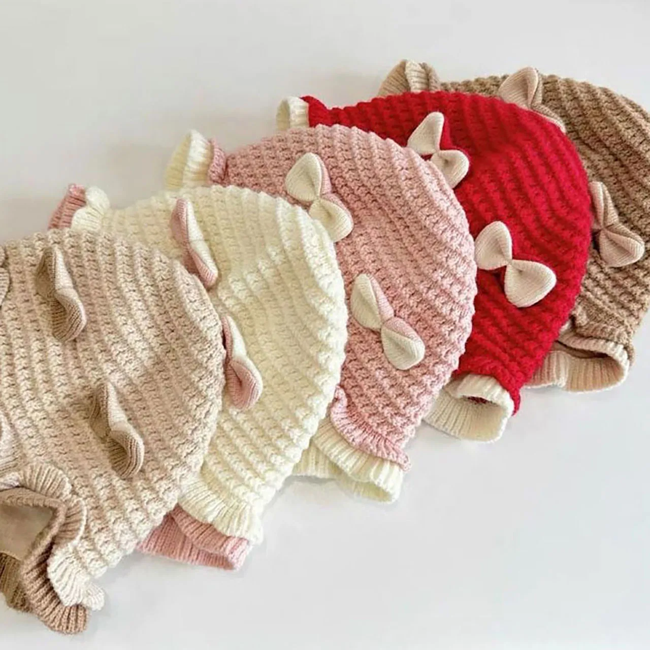 لطيف القوس طفلة الشتاء قبعة لينة محبوك كشكش الرضع الطفل حماية الأذن سميكة الدافئة يندبروف طفل إيرفلاب قبعة صغيرة