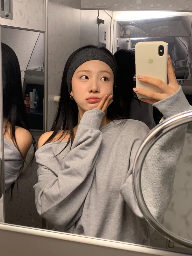 

Стильная женская толстовка с открытыми плечами и длинными рукавами, свободного кроя, из полиэстера, в корейском стиле, повседневная, весенняя, модный дизайн