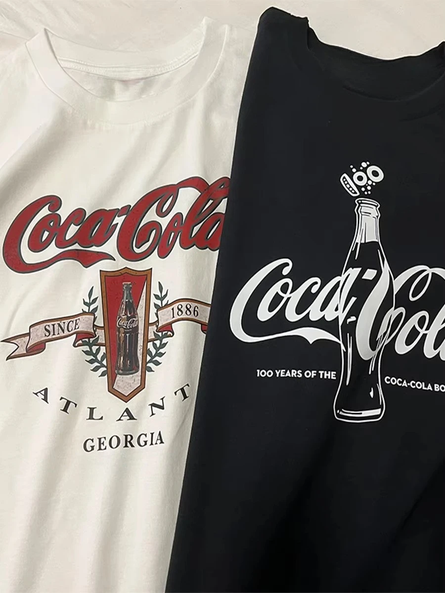 Camiseta de Manga Corta de Algodón Puro Coca-Cola, Verano 2026, Ropa Nueva para Hombre, Top Informal para Mujer, Camiseta con Estampado de Moda