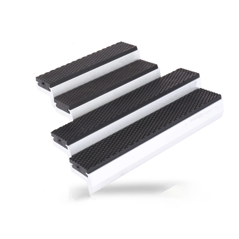 Industrial Magnetic Vise Jaw Protectors with Aluminum Housing and Textured Rubber Strips for Enhanced Grip on Metal Surfaces