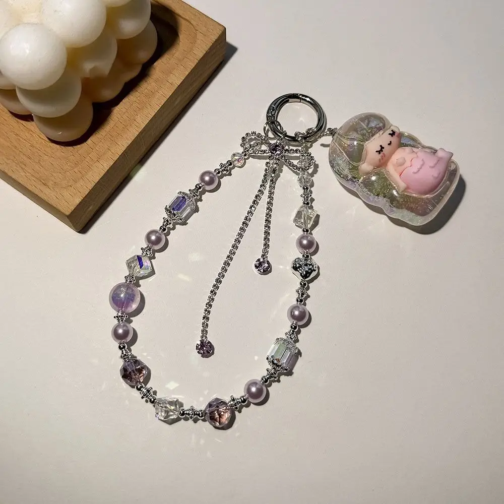 สายคล้องโทรศัพท์แบบพู่ประดับโบว์รูปหัวใจ ป้องกันการสูญหาย สายคล้องมือถือ จี้ห้อยกระเป๋า ประดับลูกปัด สำหรับสาวๆ ผู้หญิง