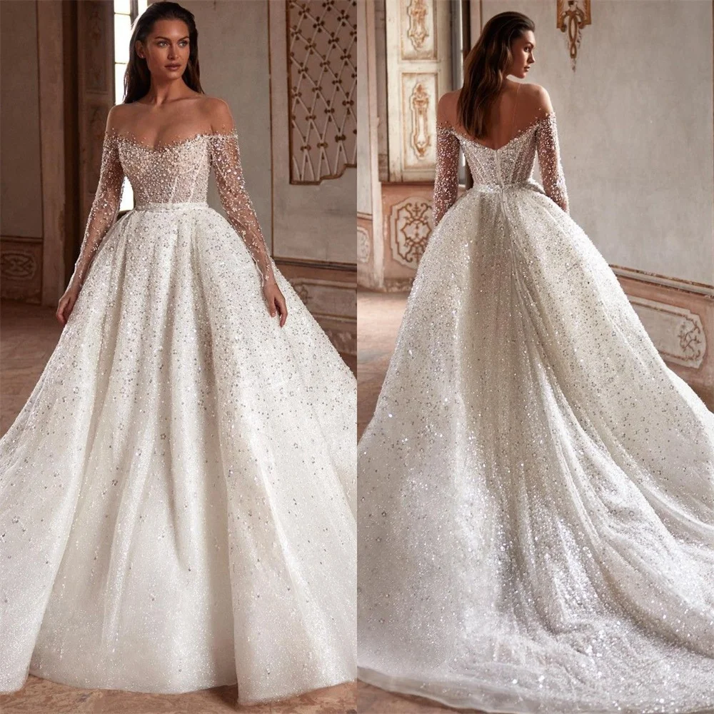 Luxury a Line Wedding Dresses Sexy Illusion Neck Long Sleeves Bridal Gown Graceful Beads Pearls Sequins Designer Gowns