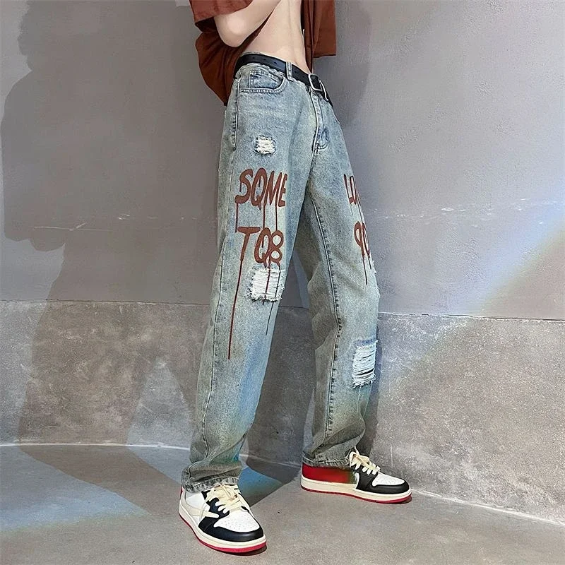 

Men's Jeans Torn Broken Man Cowboy Pants with Print Letter Trousers Ripped Holes Hip Hop Streetwear 2024 Fashion Stacked Trend