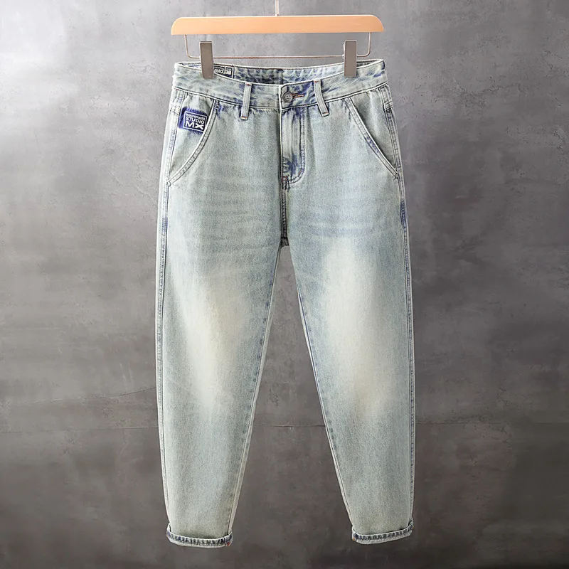 Celana denim pria musim gugur terbaru, warna terang, efek cuci, model sedikit meruncing, longgar, trendi, serbaguna, dan ramping.