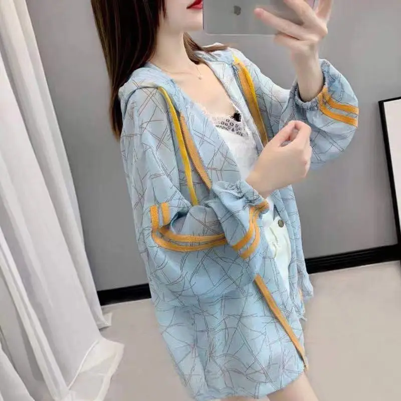 Fashion Hooded Spliced Lace Up Shirring Printed Zipper Shirt Women\'s Clothing 2023 Summer New Casual Tops All-match Blouse