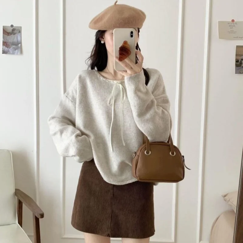 

Нежный вязаный свитер во французском стиле с завязками спереди, мягкий трикотаж для женщин, весна-осень, новая модная красивая повседневная одежда, стильный дизайн.