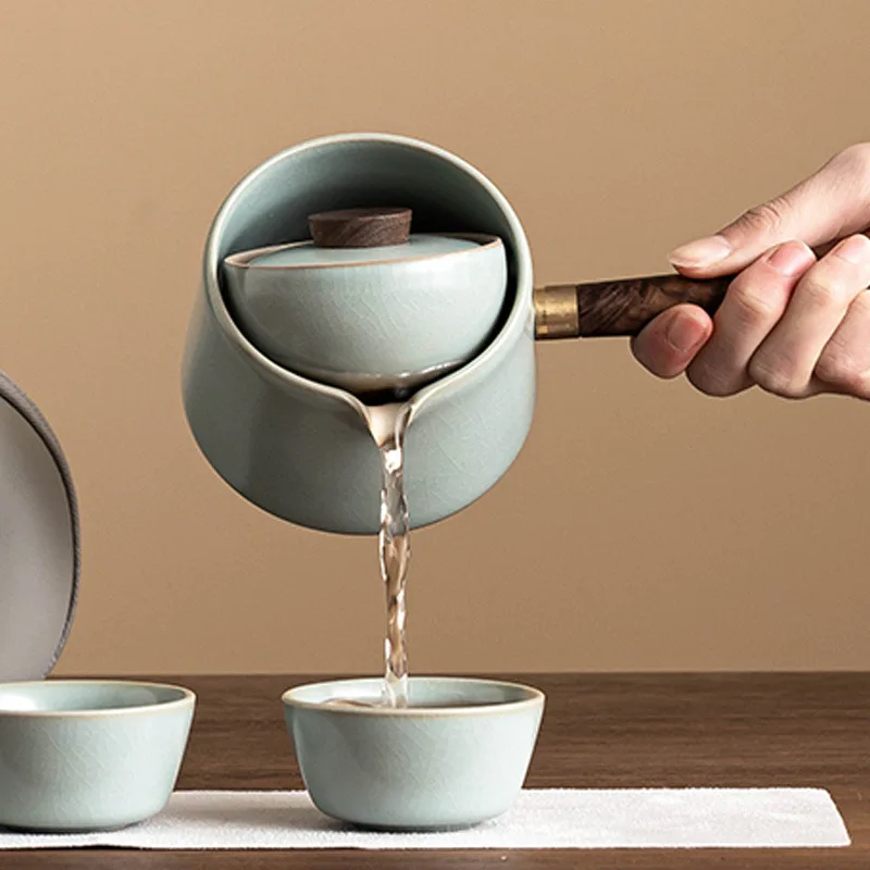 

DSA Ru kiln side handle pot tea set creative rotation teapot tea home outdoor not hot, one pot three cups