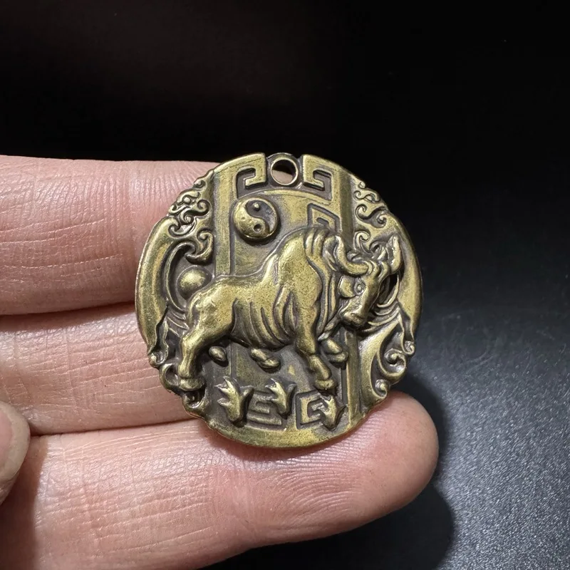 Solid cast double-sided round pendant featuring Eight Trigrams and Zodiac sign of the Ox, keychain, small brass or