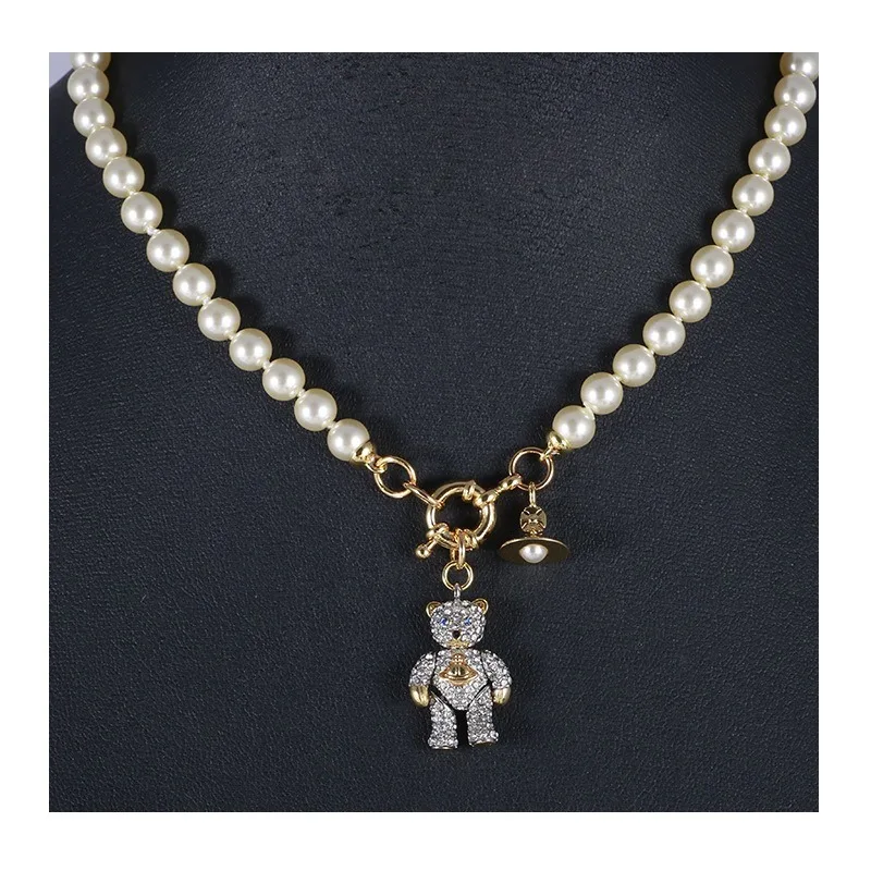 

Creative Niche Design Three-dimensional Bear Teddy Bear Shape Inlaid with Diamonds and Pearls Necklace Female Mixed Batch